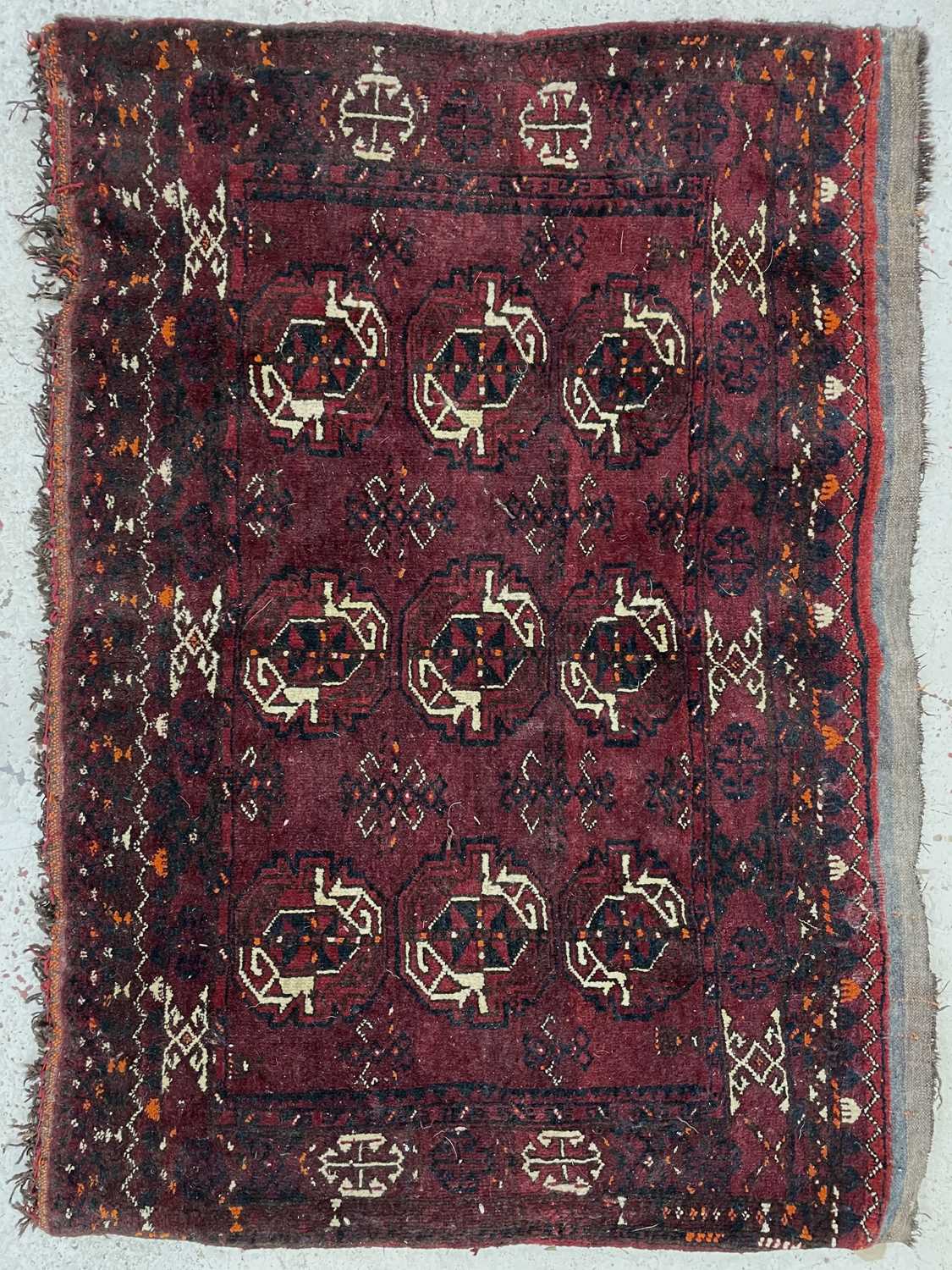 Lot 1208 - An Afghan Juval, the madder field with three...