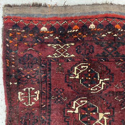 Lot 1208 - An Afghan Juval, the madder field with three...