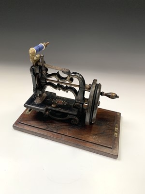 Lot 219 - A Victorian small sewing machine, by James...