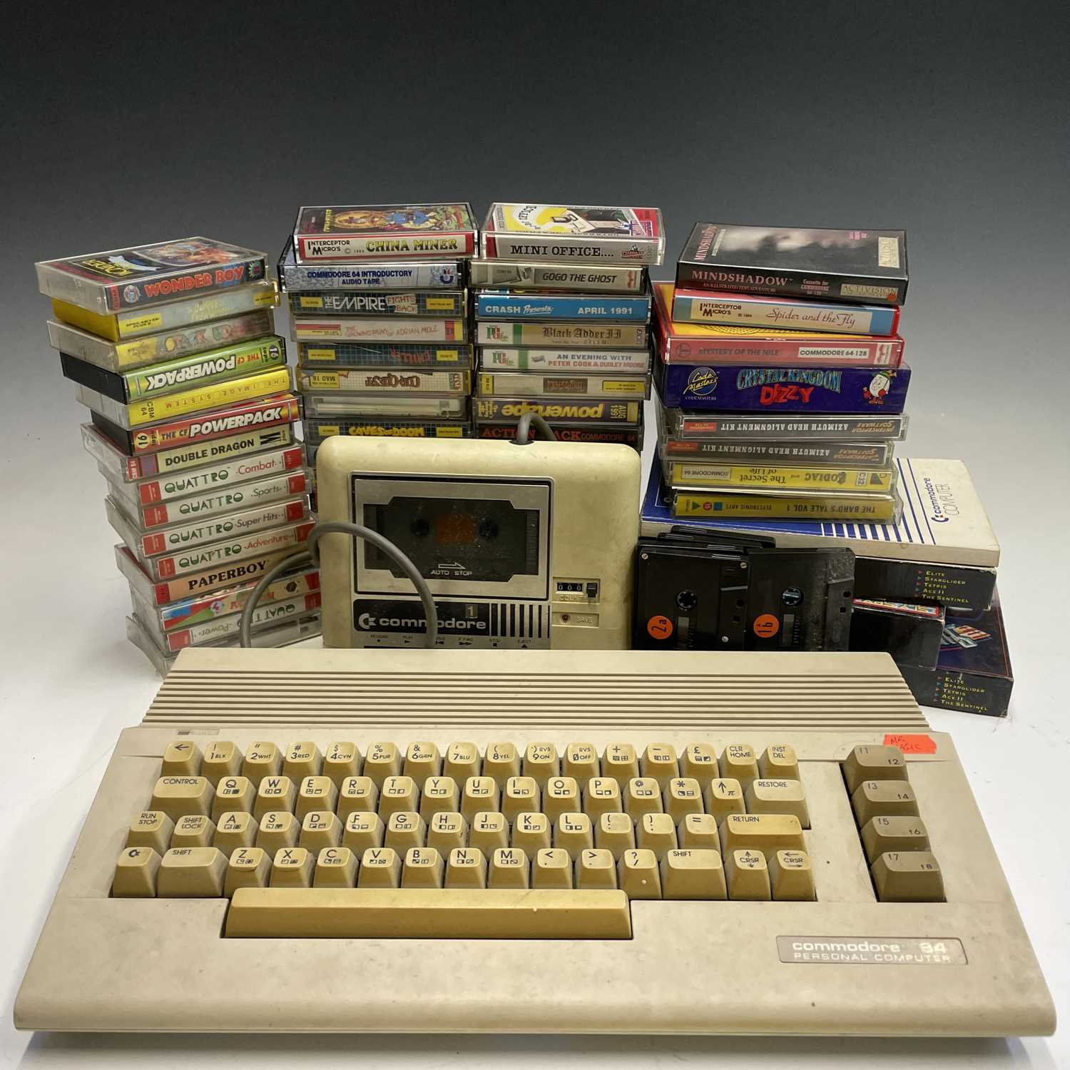 Lot 350 - A Commodore 64 with an original cassette tape...