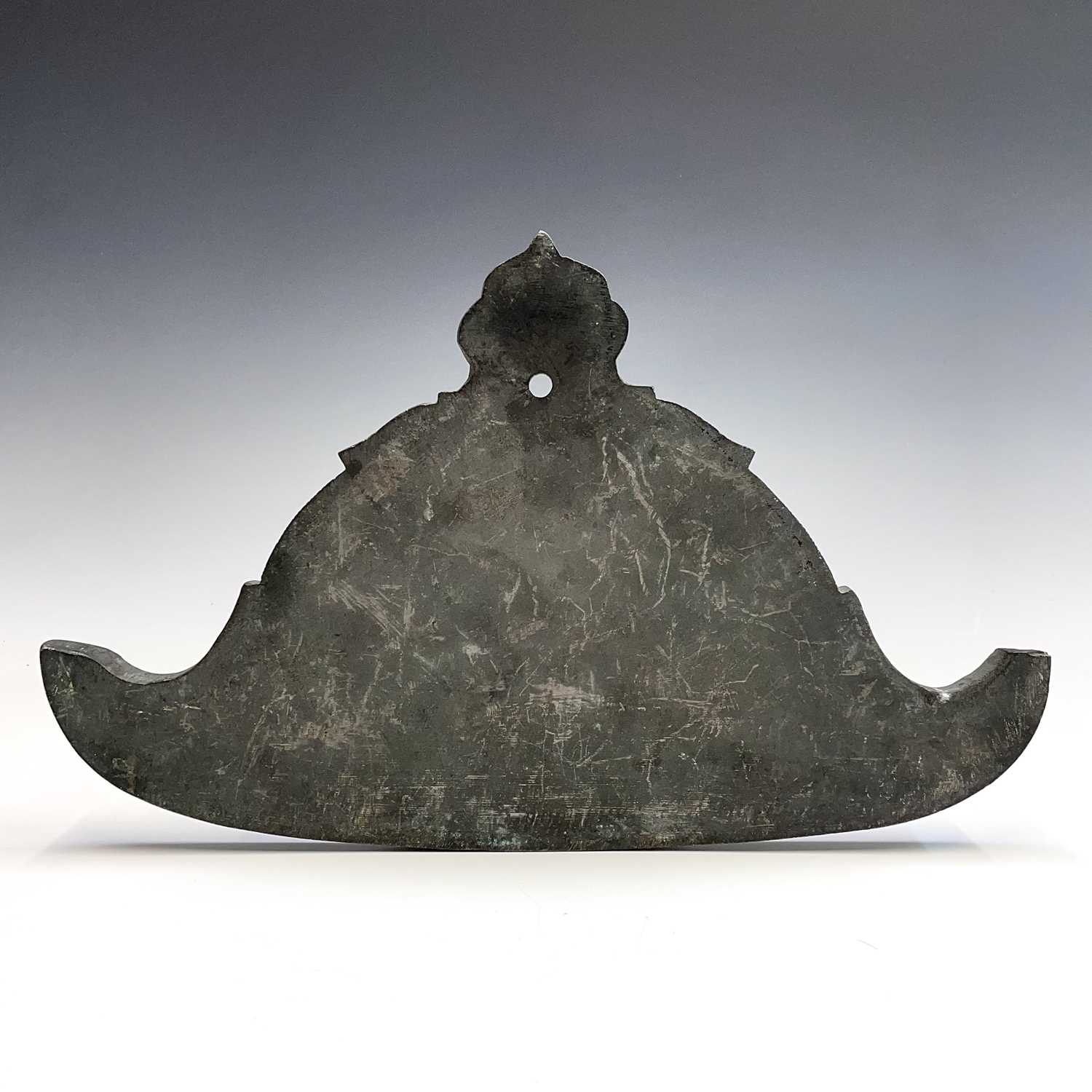 Lot 115 - A Chinese bronze temple gong, of archaic...