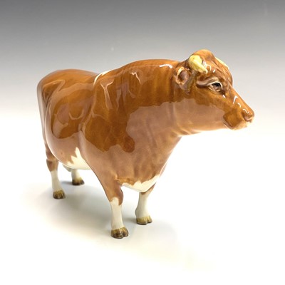 Lot 840 - Three Beswick models of Guernsey cattle,...