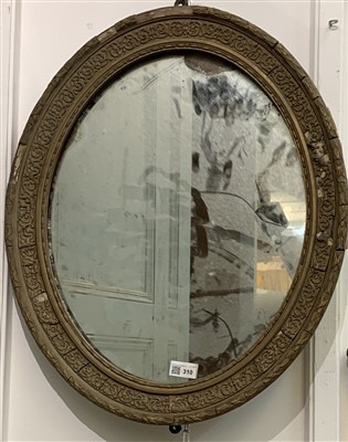 Lot 310 - A 19th century gilt composition wall mirror.