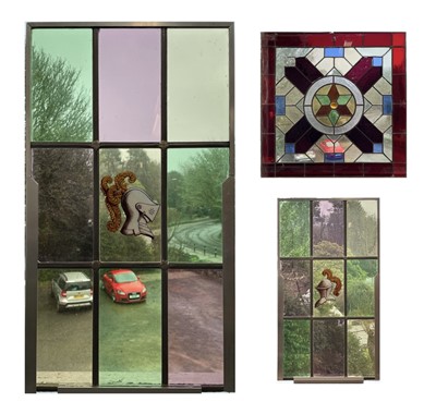 Lot 51 - A square stained glass panel with a...
