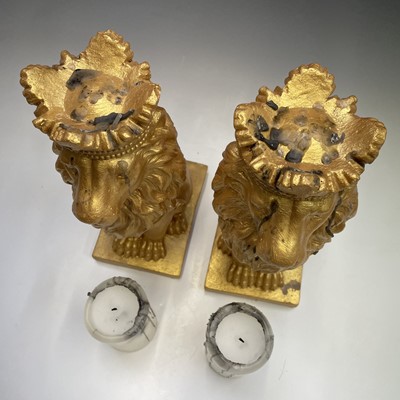 Lot 111 - Pair of gold painted lions with candles,...