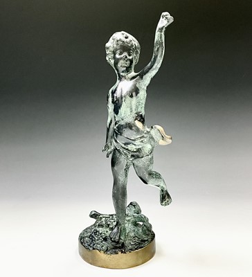 Lot 113 - A cast metal figure of putto indistinctly...