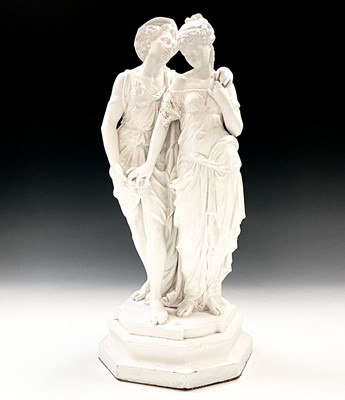 Lot 143 - A painted spelter cast group of lovers in the...