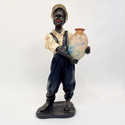 Lot 190 - A life size standing figure of a child in...