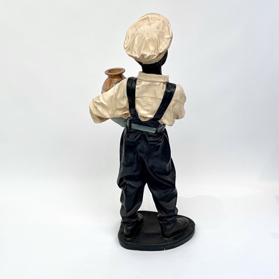 Lot 190 - A life size standing figure of a child in...