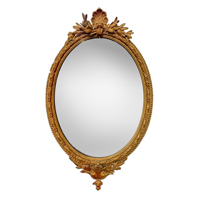 Lot 3070 - A late 19th century gilt framed oval mirror...