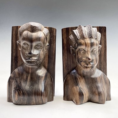 Lot 71 - A pair of African ironwood bookends carved...