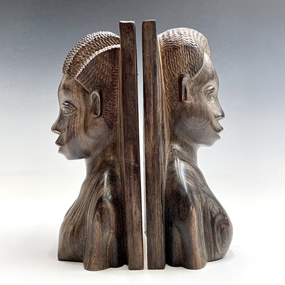 Lot 71 - A pair of African ironwood bookends carved...