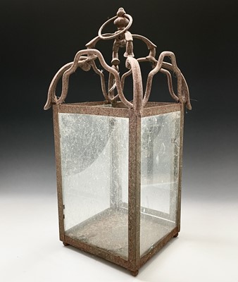 Lot 194 - An iron framed outdoor hanging lantern, height...