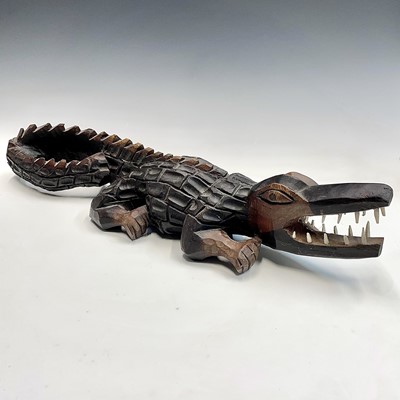 Lot 199 - An African wood carved crocodile with bone...