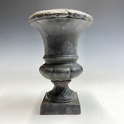 Lot 188 - A cast iron black painted campana urn, height...