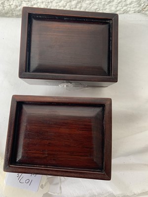 Lot 107 - A pair of Chinese hardwood boxes, each mounted...