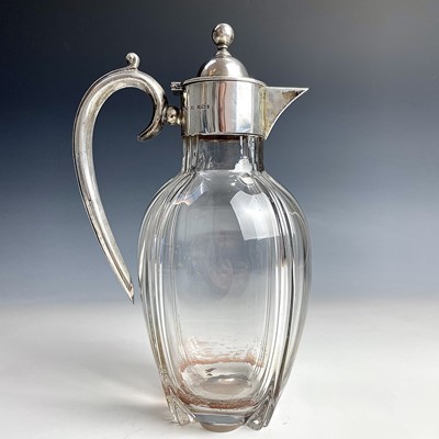 Lot 51 - A Victorian silver mounted glass claret jug by...