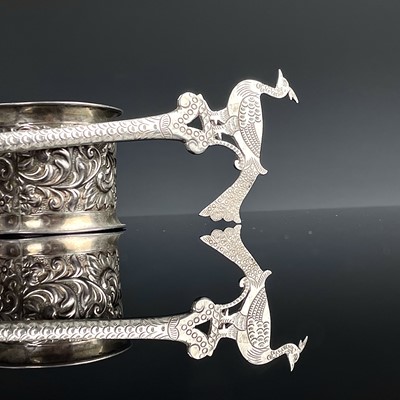Lot 57 - A Persian silver olive spoon with peacock...
