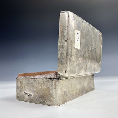 Lot 59 - A George V silver cigarette box, engraved...