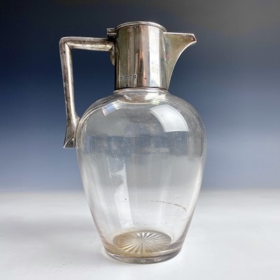 Lot 60 - A George V silver mounted glass claret jug by...
