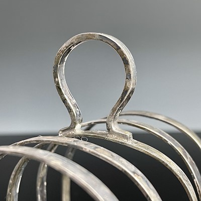 Lot 62 - Two silver hallmarked four section toast racks,...