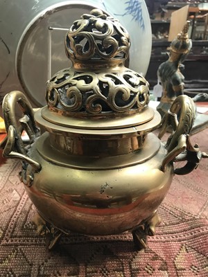Lot 53 - A Chinese polished bronze ding, early 20th...