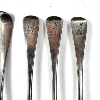 Lot 66 - Three George III silver table forks, London...