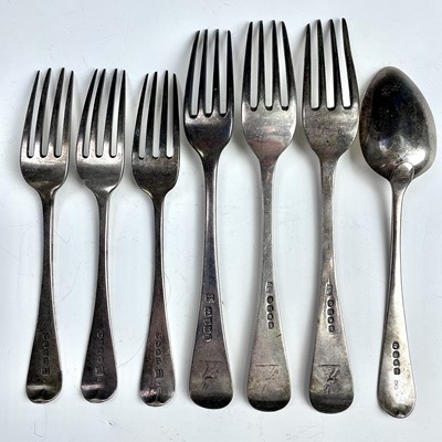 Lot 66 - Three George III silver table forks, London...