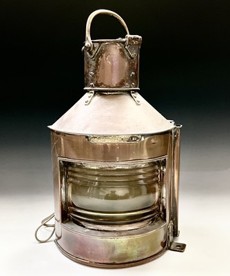 Lot 178 - A copper ships lantern with brass fittings...