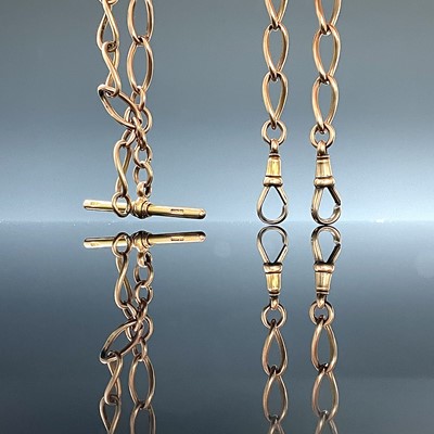 Lot 793 - A 15ct gold curb link double watch chain...