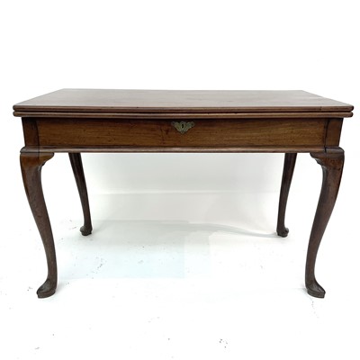 Lot 3018 - A George II walnut fold-top tea table, with...