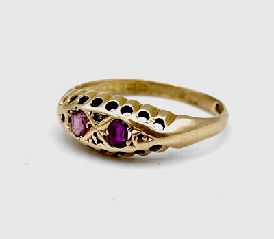Lot 627 - A George V 18ct gold pink sapphire set two...
