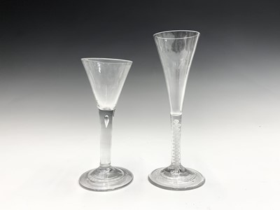 Lot 1010 - An early 18th century wine glass, the trumpet...