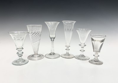 Lot 1011 - A Georgian wine glass, the bell bowl on a...