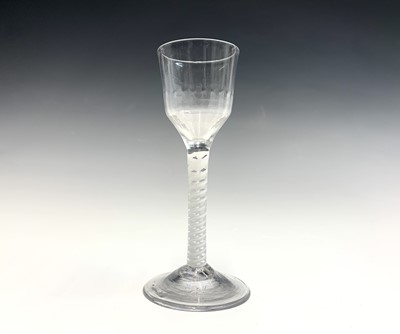 Lot 1014 - A George III wine glass the half-fluted ogee...