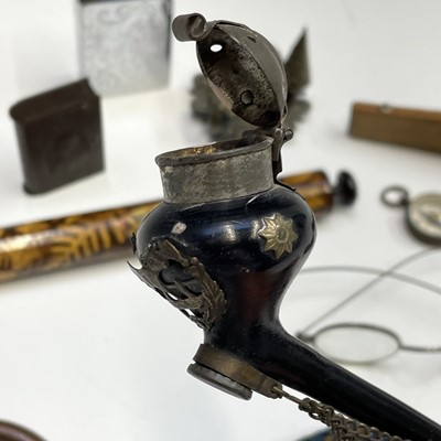 Lot 61 - A Regency miniature cast brass taper holder...