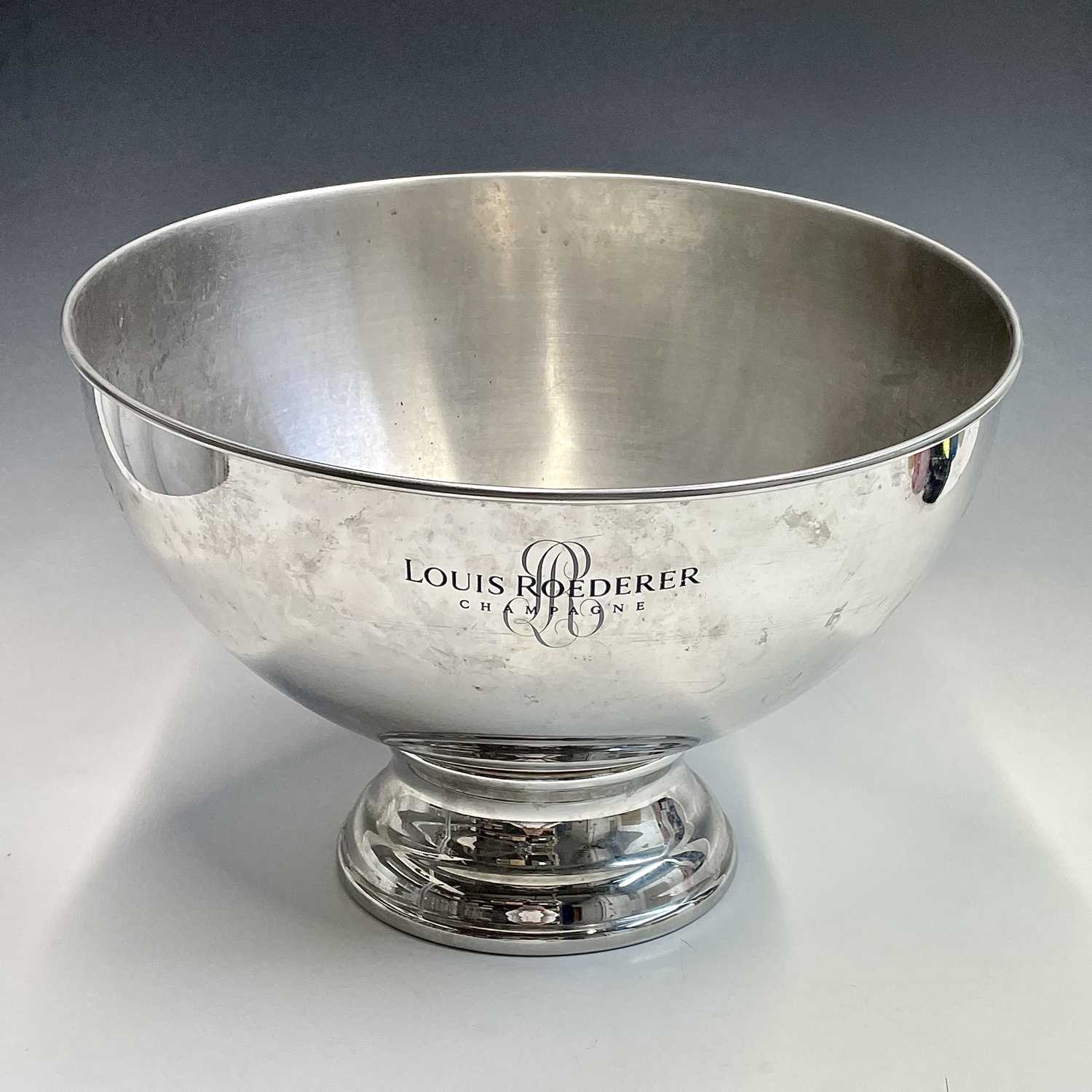 Lot 193 - A four bottle tilted bowl champagne bucket...