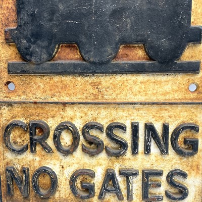 Lot 152 - A cast metal sign 'CROSSING NO GATES', 58cm x...