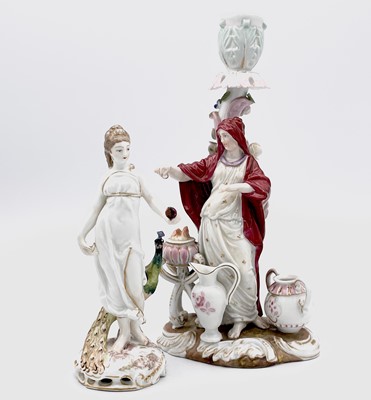 Lot 822 - A German porcelain figural candle holder,...