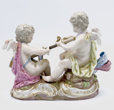 Lot 823 - A Meissen figure of two cherubs unsheathing a...