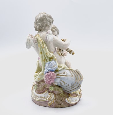 Lot 823 - A Meissen figure of two cherubs unsheathing a...