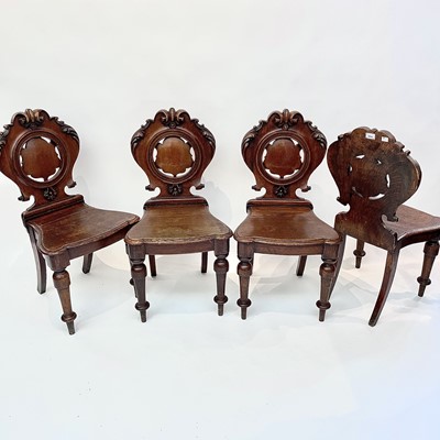 Lot 3034 - A set of four Victorian oak hall chairs with...