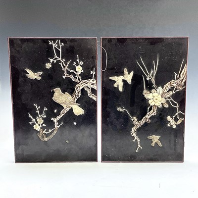 Lot 143 - A pair of Japanese bone and black lacquered...
