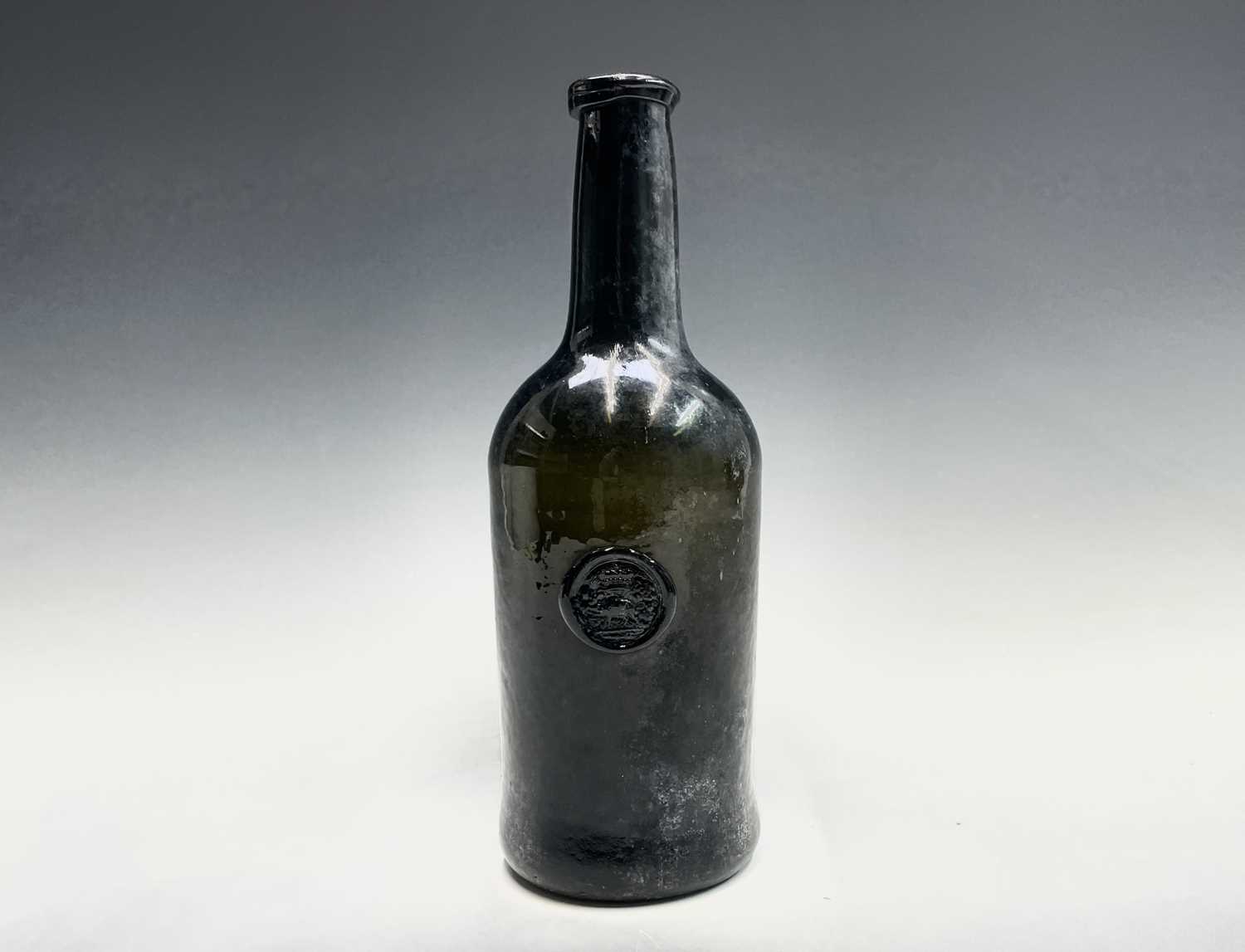 Lot 804 - A mid 18th century sealed wine bottle, thick