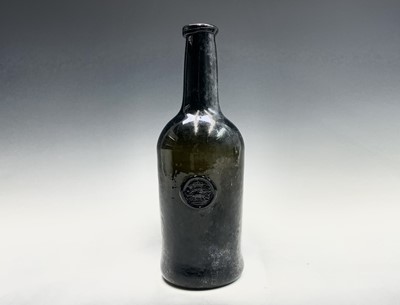 Lot 804 - A mid 18th century sealed wine bottle, thick...