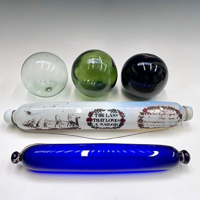 Lot 993 - A Victorian opaque glass rolling pin, transfer...