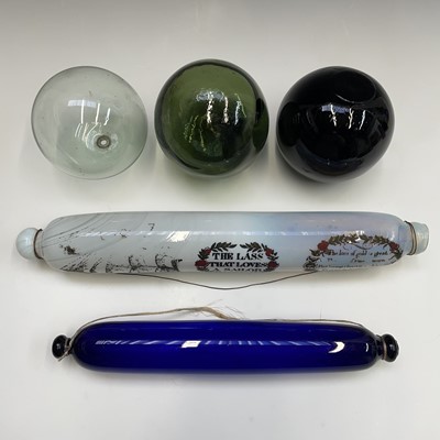 Lot 993 - A Victorian opaque glass rolling pin, transfer...