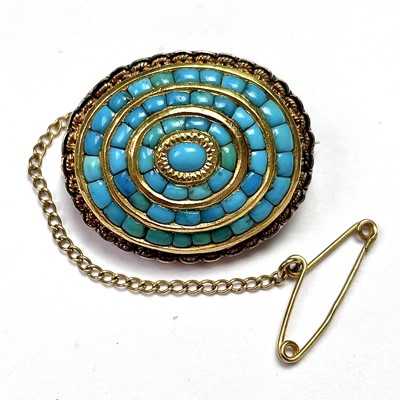 Lot 754 - A Victorian turquoise set oval target brooch,...