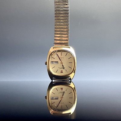 Lot 978 - An Omega Megaquartz 32KHZ day date gentlemans...