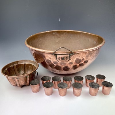 Lot 209 - A late 19th century domed copper mixing bowl,...